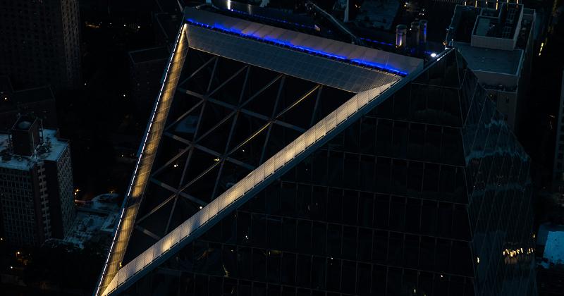 The edge of the skyscraper building in the night