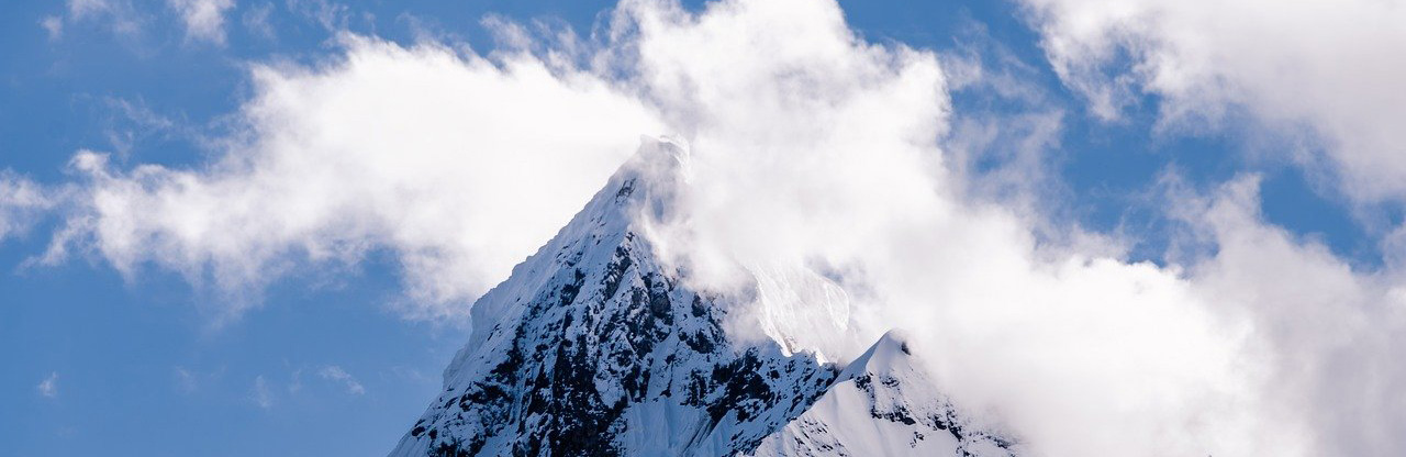 Mountain peaks covered in snow background